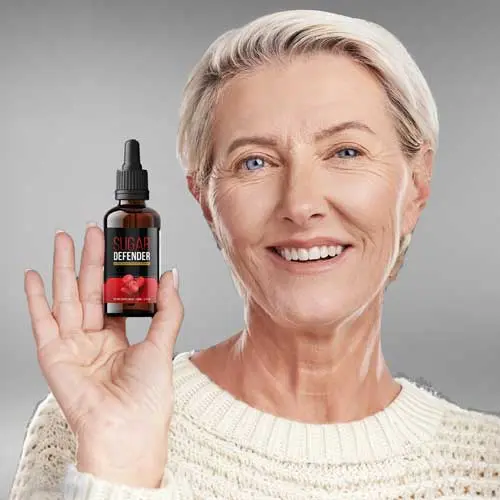 Sugar Defender lady holding one bottle 